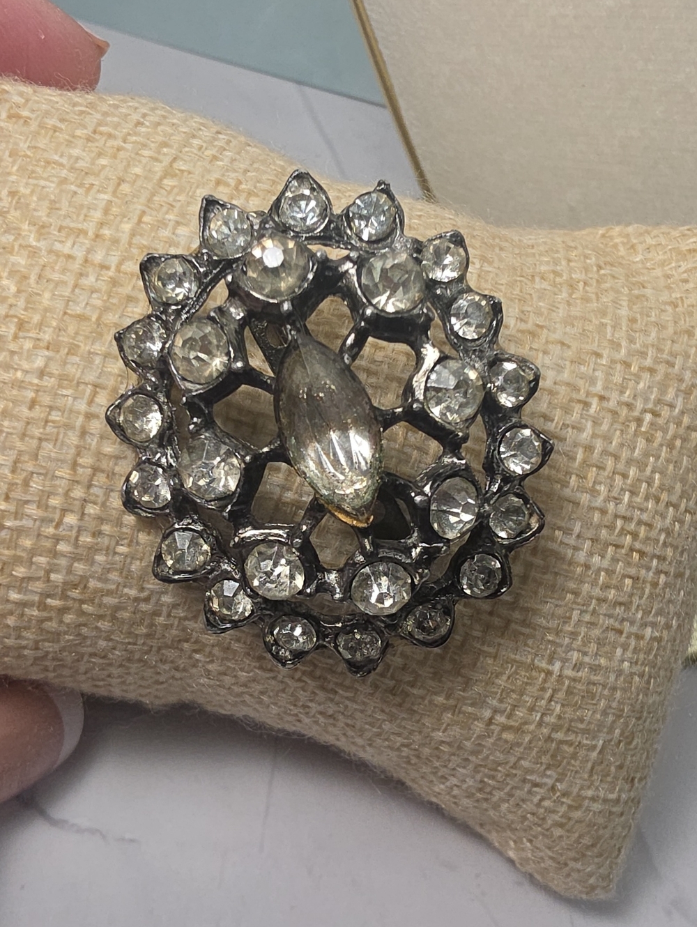 Vintage Oval Brooch featuring a dark Japanned metal setting W/ Central Marquise
